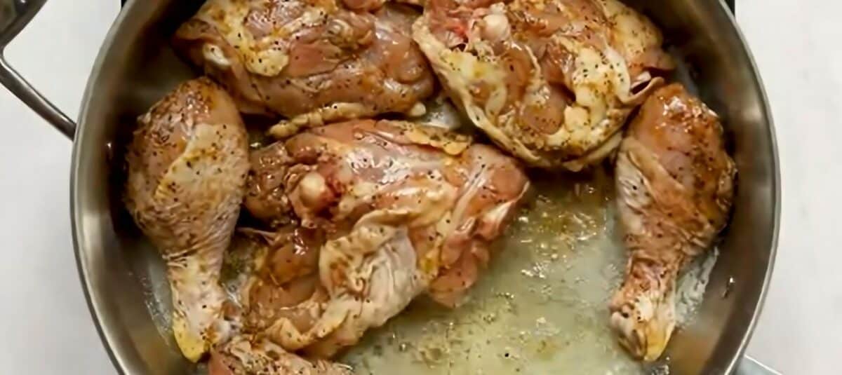 Pan frying the chicken thighs.