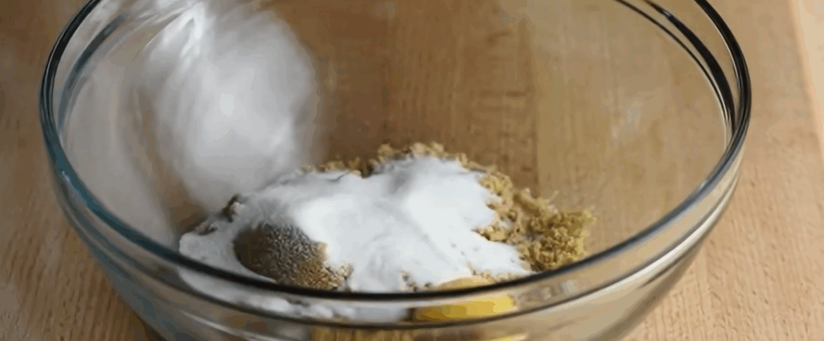 Preparing the cookie batter in a glass bowl.