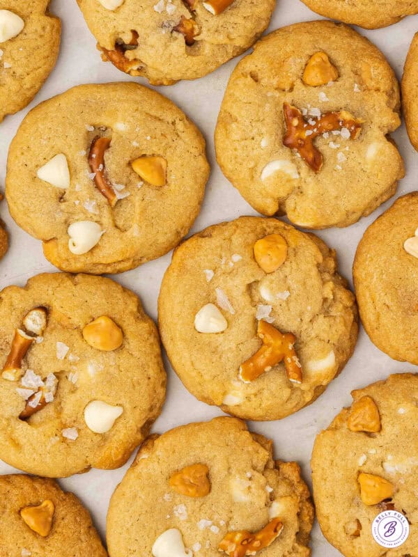 Butterscotch chip pretzel cookies on a baking sheet
