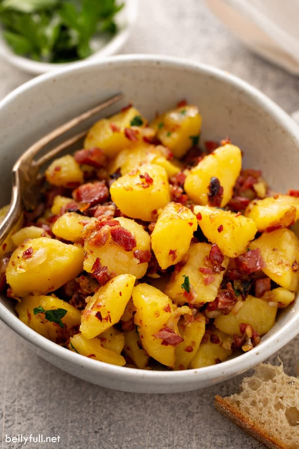 corned beef hash in bowl with fork