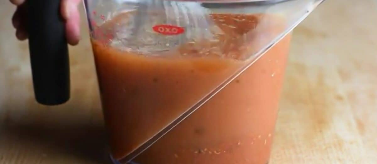 Ingredients to make the sauce in a measuring cup.