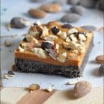 A no-bake Oreo-crusted butterscotch bar sprinkled with sea salt and dark chocolate almonds. Perfect treat for summer or any time! #ad