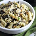 This is an ideal summer dish where olives and pine nuts are the stars. Simple, delicious, and the only cooking required is the pasta!