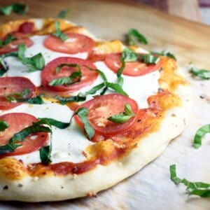 Made with fresh marinara sauce, mozzarella cheese, and basil, Margherita pizza is simple, classic, so easy, and absolutely delicious!