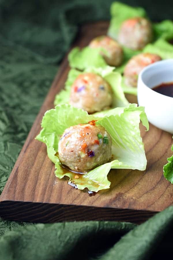 Asian Turkey Meatballs with a sweet and spicy glaze, served with noodles or in lettuce cups!