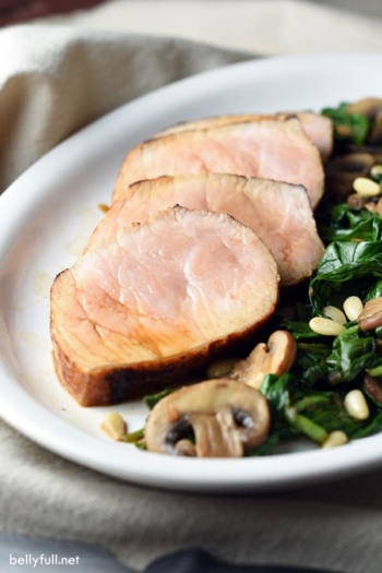 Pork Tenderloin is marinated in steakhouse mushroom spices, then cooked to perfection. Served alongside sautéed spinach and baby bellas, it’s ra complete meal ready in only 30 minutes. Perfect for any night of the week!