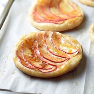 These Individual Apple Tarts are light, sweet, and delicious. They’re incredibly easy, but look so fancy!