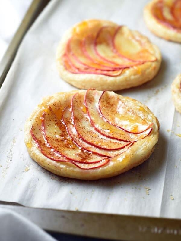 These Individual Apple Tarts are light, sweet, and delicious. They’re incredibly easy, but look so fancy!