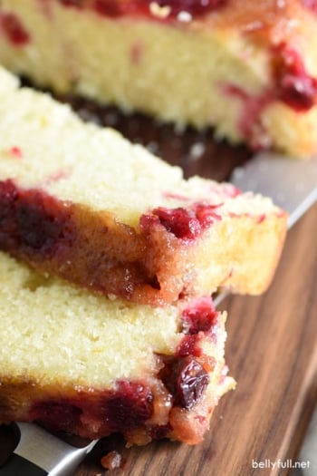 This upside down quick bread is buttery and moist, with a sweet and tangy brown sugar cranberry topping and orange zest speckled throughout. Perfect for the holidays. So easy and good!