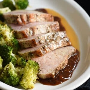 Pork loin filet is rubbed with salt, pepper, and thyme, then roasted and topped with a sublime fig sauce. Festive and simple, perfect for holiday entertaining!