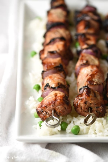 Marinated roasted garlic and black pepper pork tenderloin is grilled to perfection and served with a tangy pineapple cilantro mayonnaise for an easy and quick summertime meal!