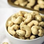 Easily transform plain cashews into Dill Pickle Cashews with herbs, buttermilk powder, and tangy citric acid. Makes a healthy, delicious, and awesome portable snack!