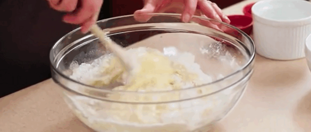 Combining wet and dry ingredients.