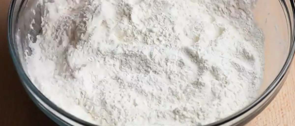 Dry ingredients in a glass bowl.