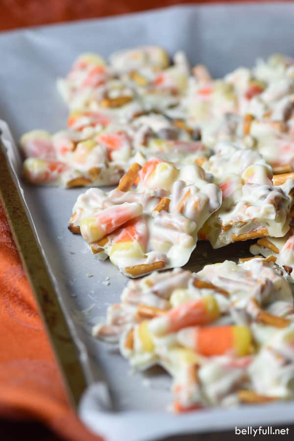 Candy Corn Pretzel Chocolate Bark on parchment paper