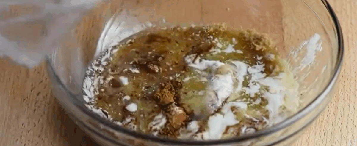 Butter and brown sugar mixture in a glass bowl. 