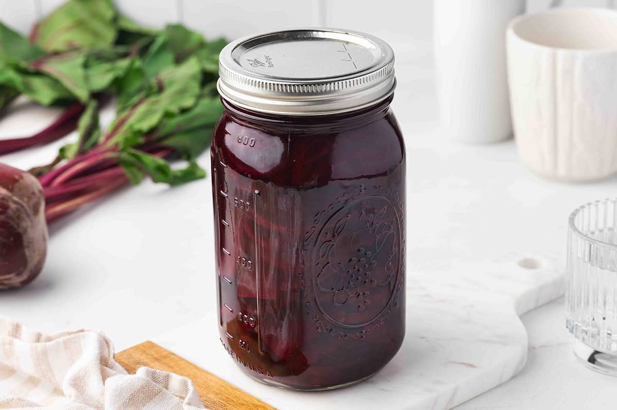 pickled beets in tall glass jar