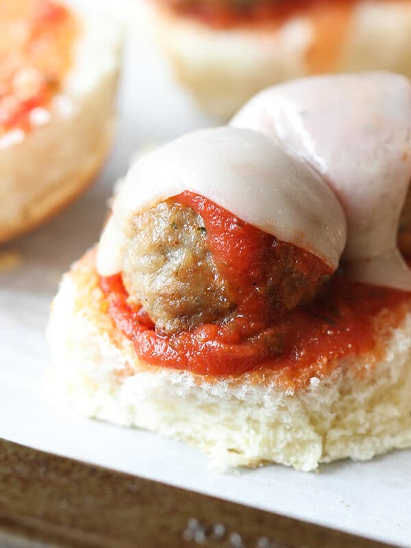 meatball sliders on baking sheet