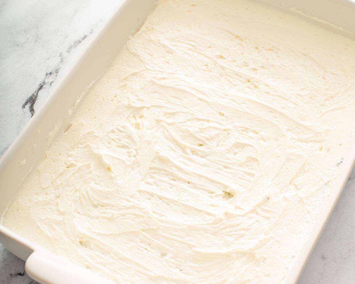 Cream cheese mixture over the Oreo cookie crust.