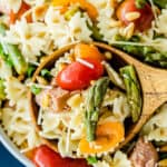 portion of Italian Pasta Salad in wooden serving spoon