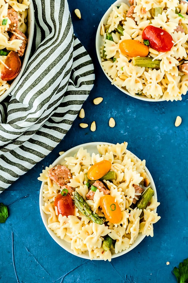 overhead picture of Italian Pasta Salad in white dish on blue background