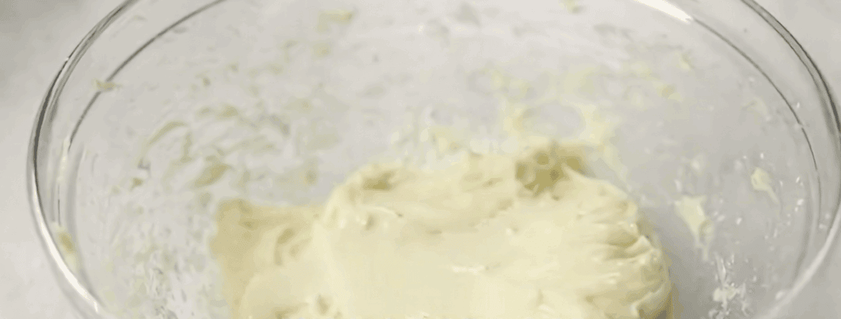 Making the topping for the dessert pizza. 