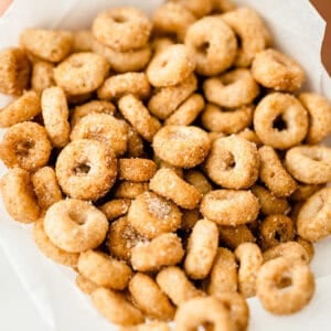 mini doughnut hot buttered Cheerios close up in paper cup