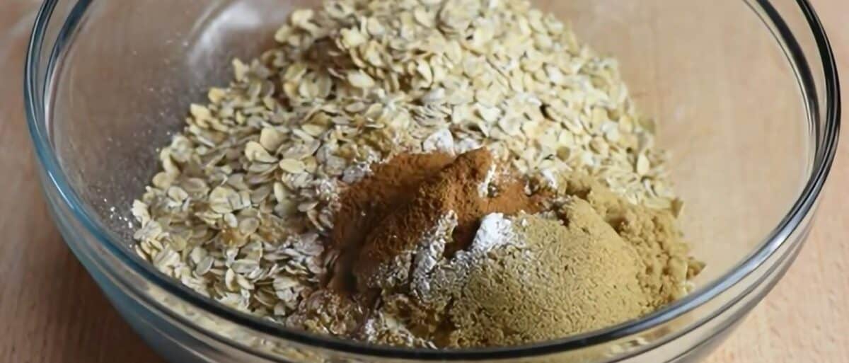 Combining the dry ingredients to make baked oatmeal.