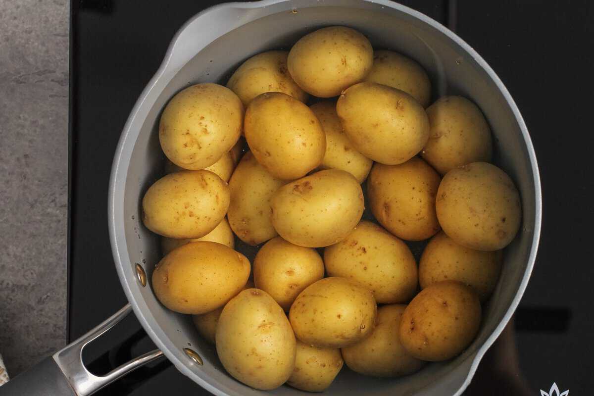 Baby new potatoes in a pot.