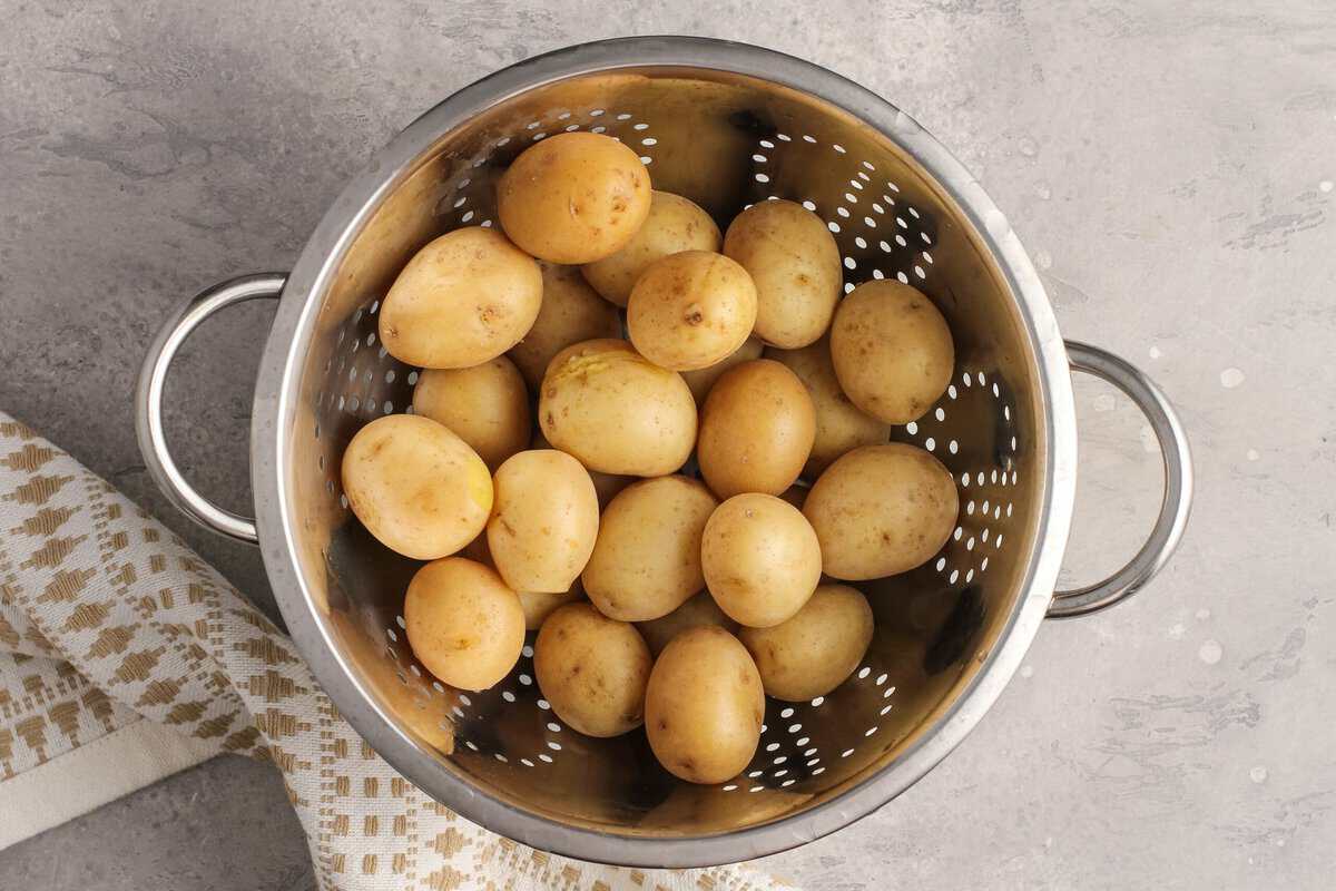 Baby new potatoes in a colander.