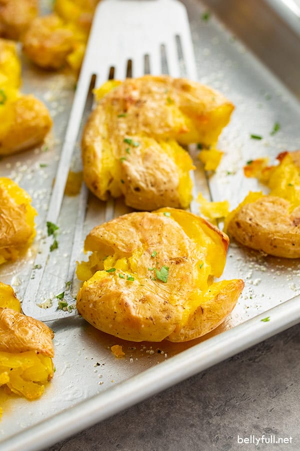 roasted smashed potatoes on wire spatula