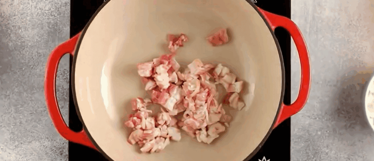 Cooking bacon in a skillet.