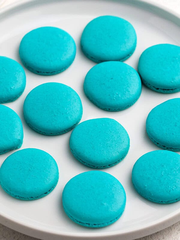 plate of blue macarons - baby yoda cookies