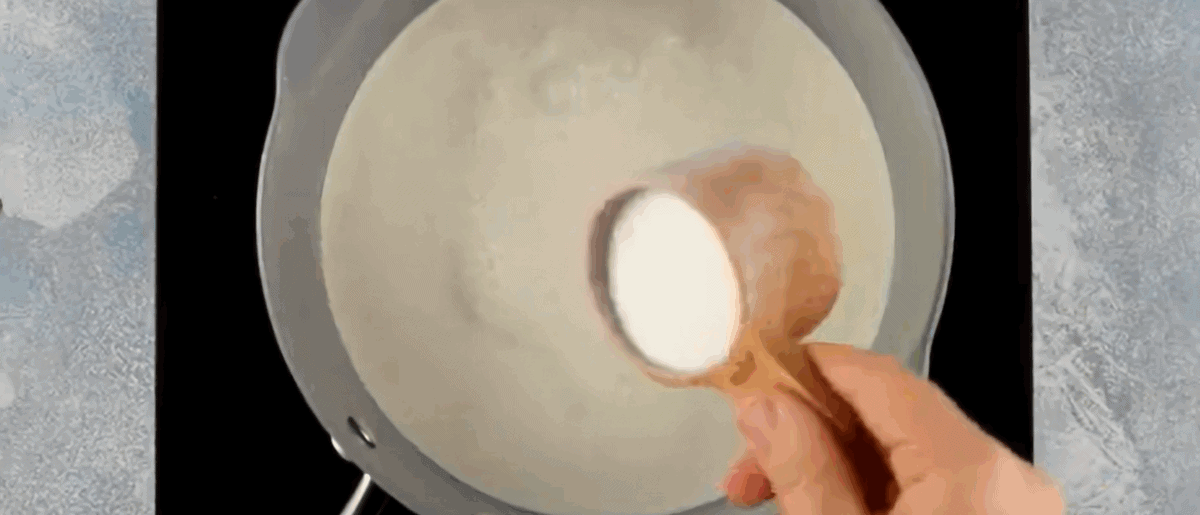 Preparing the cream and sugar mixture.