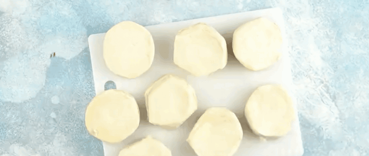 Separating the biscuit dough.