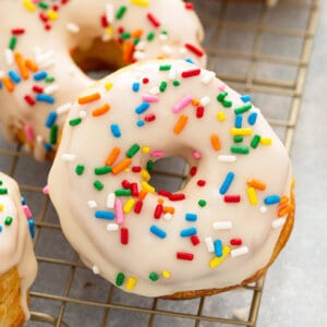 Close up glazed air fryer donuts with sprinkles
