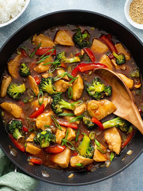 chicken and vegetable stir fry in skillet