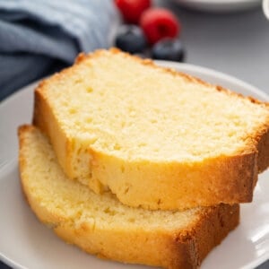 2 slices of stacked pound cake on white plate