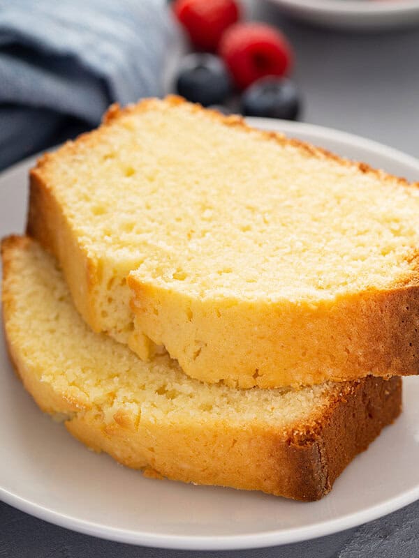 2 slices of pound cake stacked on white plate