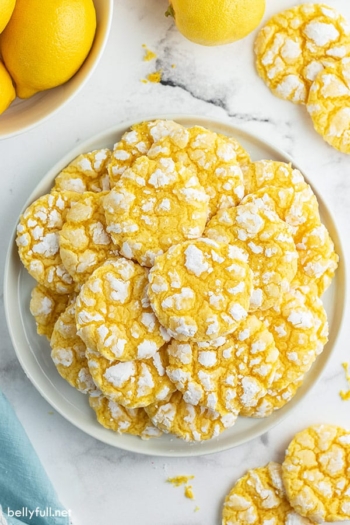 plate stacked with lemon crinkle cookies