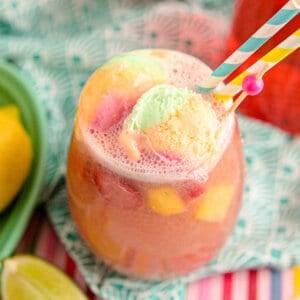 sherbet punch in glass with striped straws
