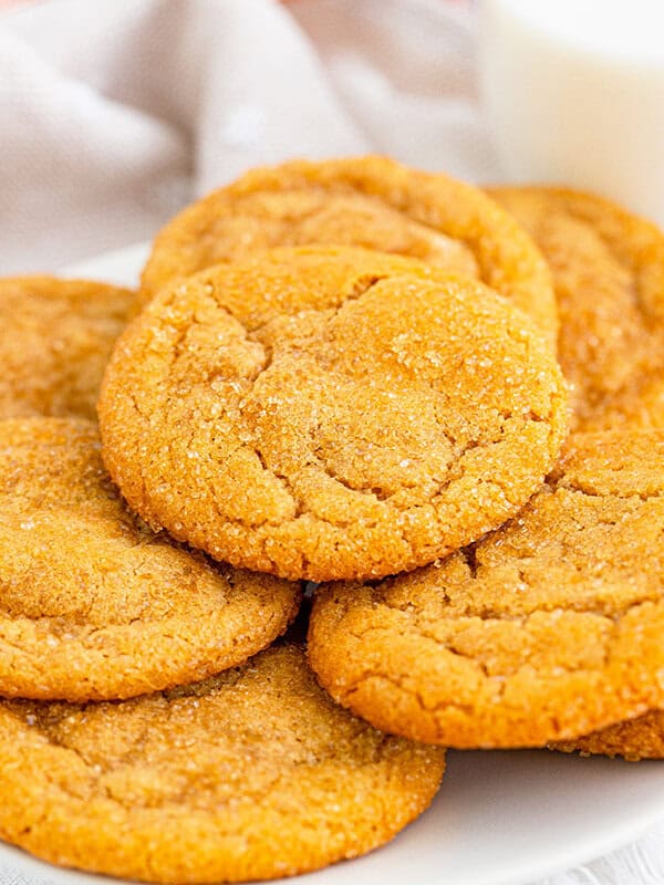 pile of brown sugar cookies on white plate