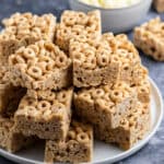 stack of cheerios marshmallow treats on white plate