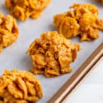 cornflake cookies on parchment paper