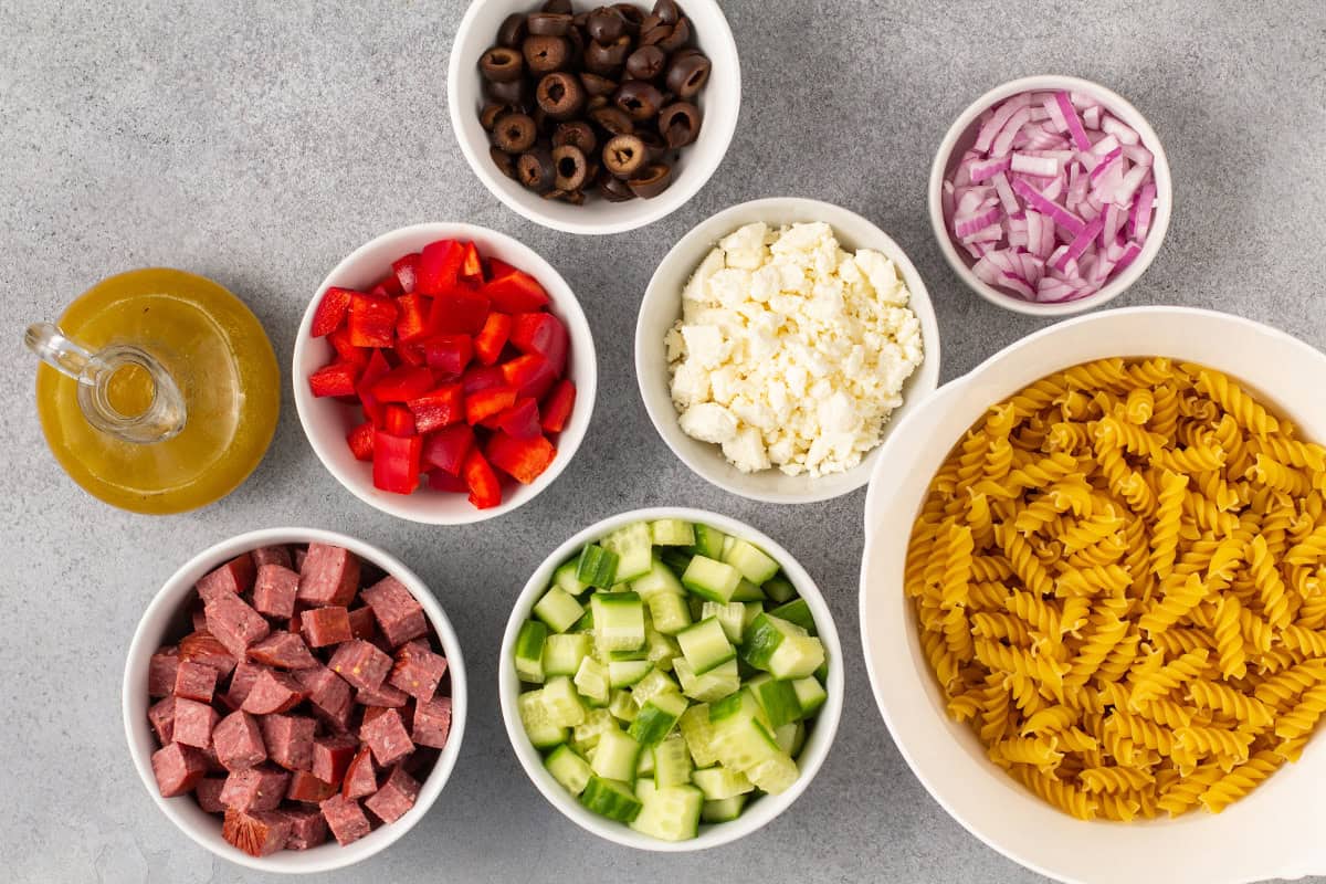Ingredients to make Greek pasta salad.