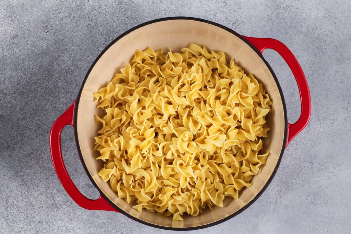 Egg noodles in a pot. 