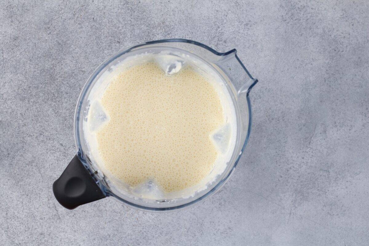 Custard ingredients in a blender.