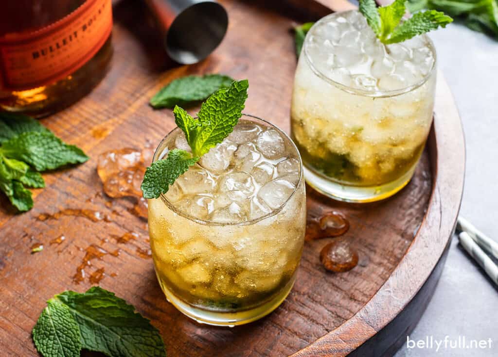 bourbon cocktail on wooden lazy susan