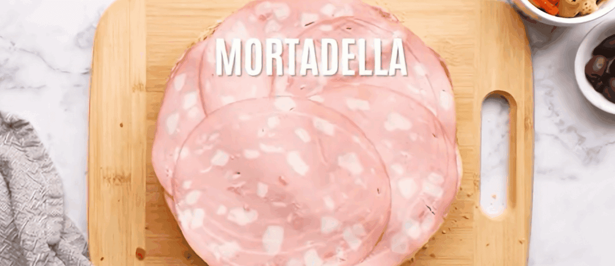 Layering the bread with the meat.