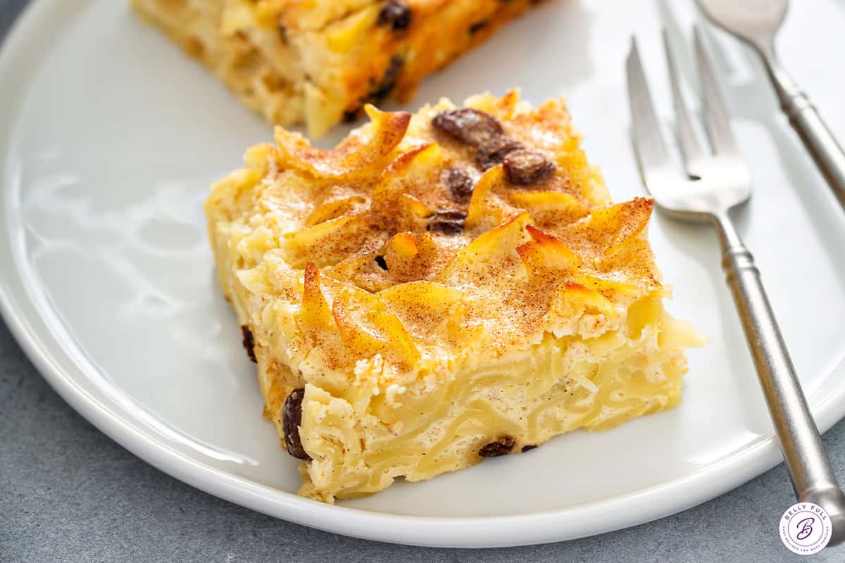 square slice of baked noodle kugel on plate